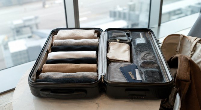 How To Pack Light For Two Weeks And Travel Smarter